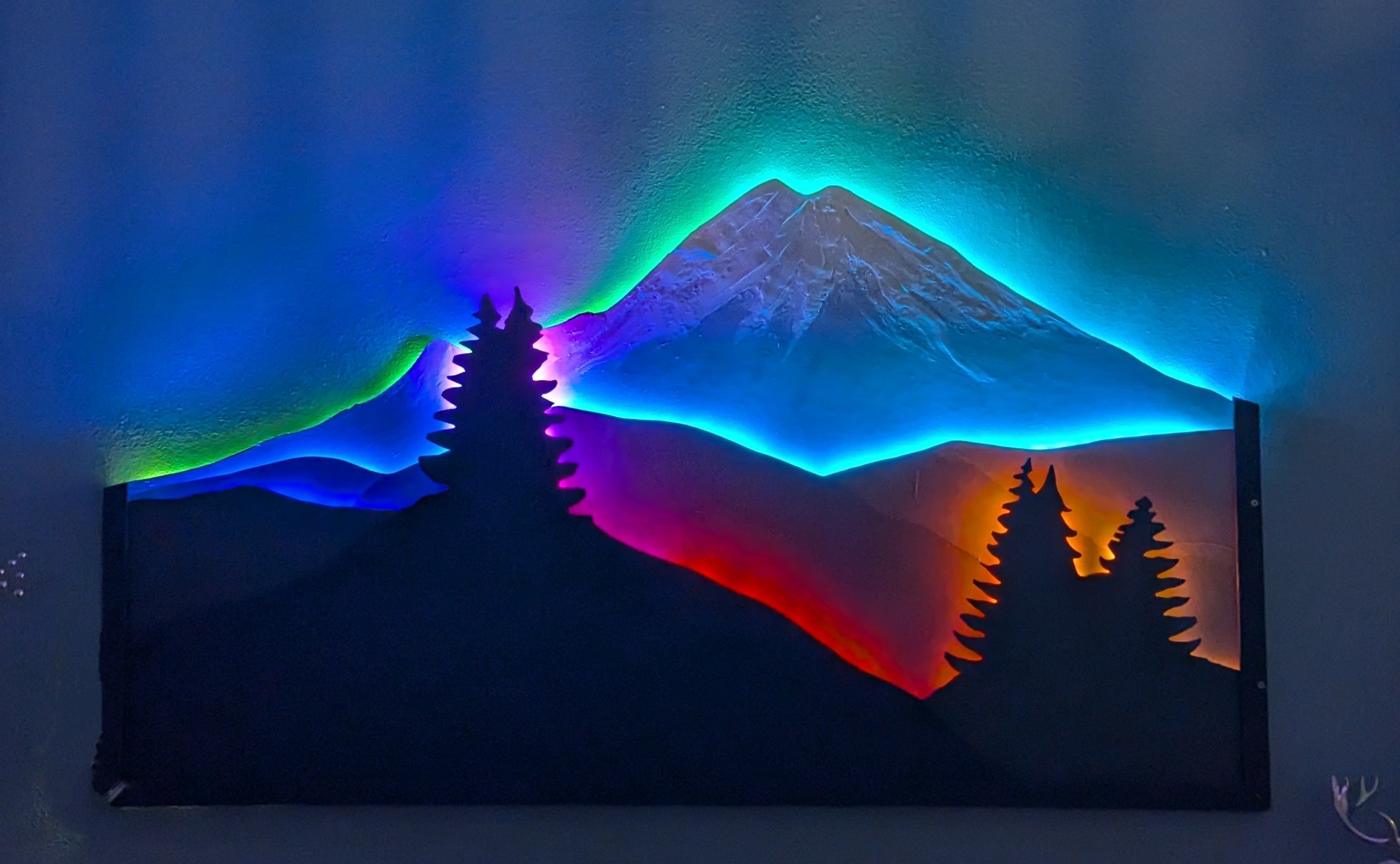 Mountain — backlit carved mountain art with multicolor aurora lighting