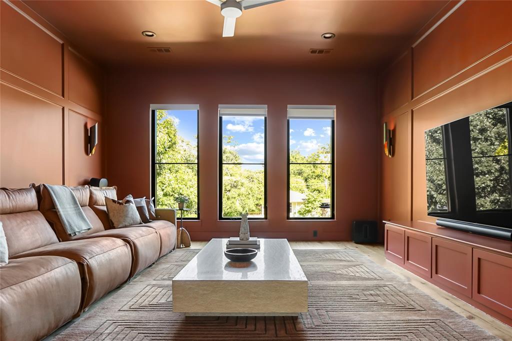 Bright Rec room transformed with Trim work and Color drenching